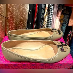 Slightly used Tory Burch Flats. The color is Grayish Taupe. Comes with Box.